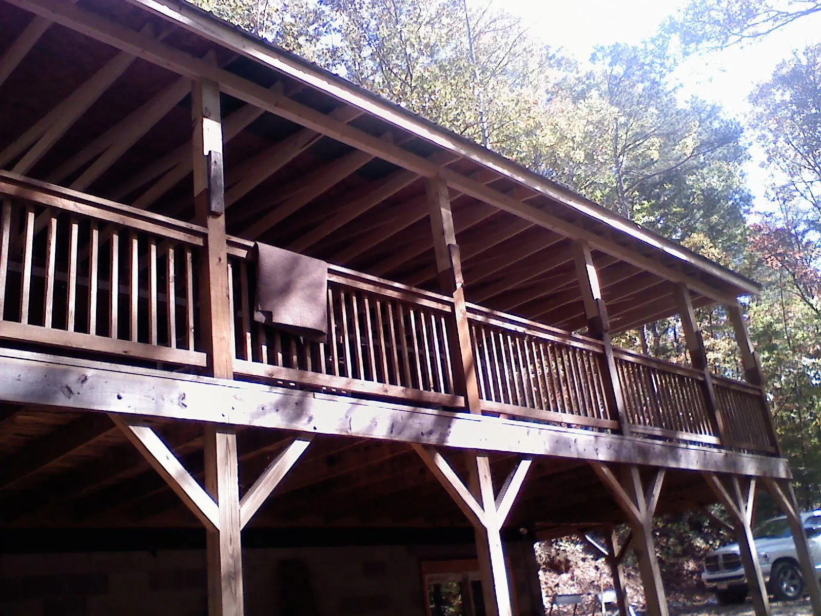 Timber framing under a new elevated porch and deck — Roof Leak Repair in Long Island by Roofing Brothers